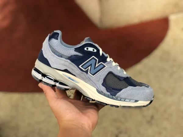 nb2002r Scarpe da corsa casual retrò New Balance Patchwork blu e bianche per uomo e donna Evergreen e bianco M2002RDI