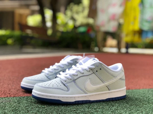 Dunk porcellana bianca e blu Nike Dunk Porcelain SB bianco blu/porcellana graffio crackle CJ6884-100