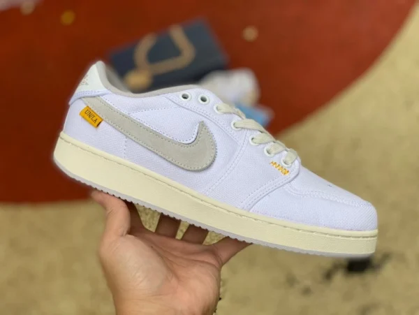 aj1 bianco grigio tela gancio unione LA x Air Jordan 1 KO Low AJ1 bianco puro basso superiore DO8912-101