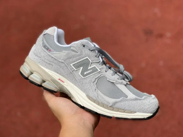 NB2002R Yuanzu Grey President Edition New Balance Serie 2002R Yuanzu Grey Scarpe da corsa sportive e per il tempo libero retrò da uomo e da donna M2002RDM